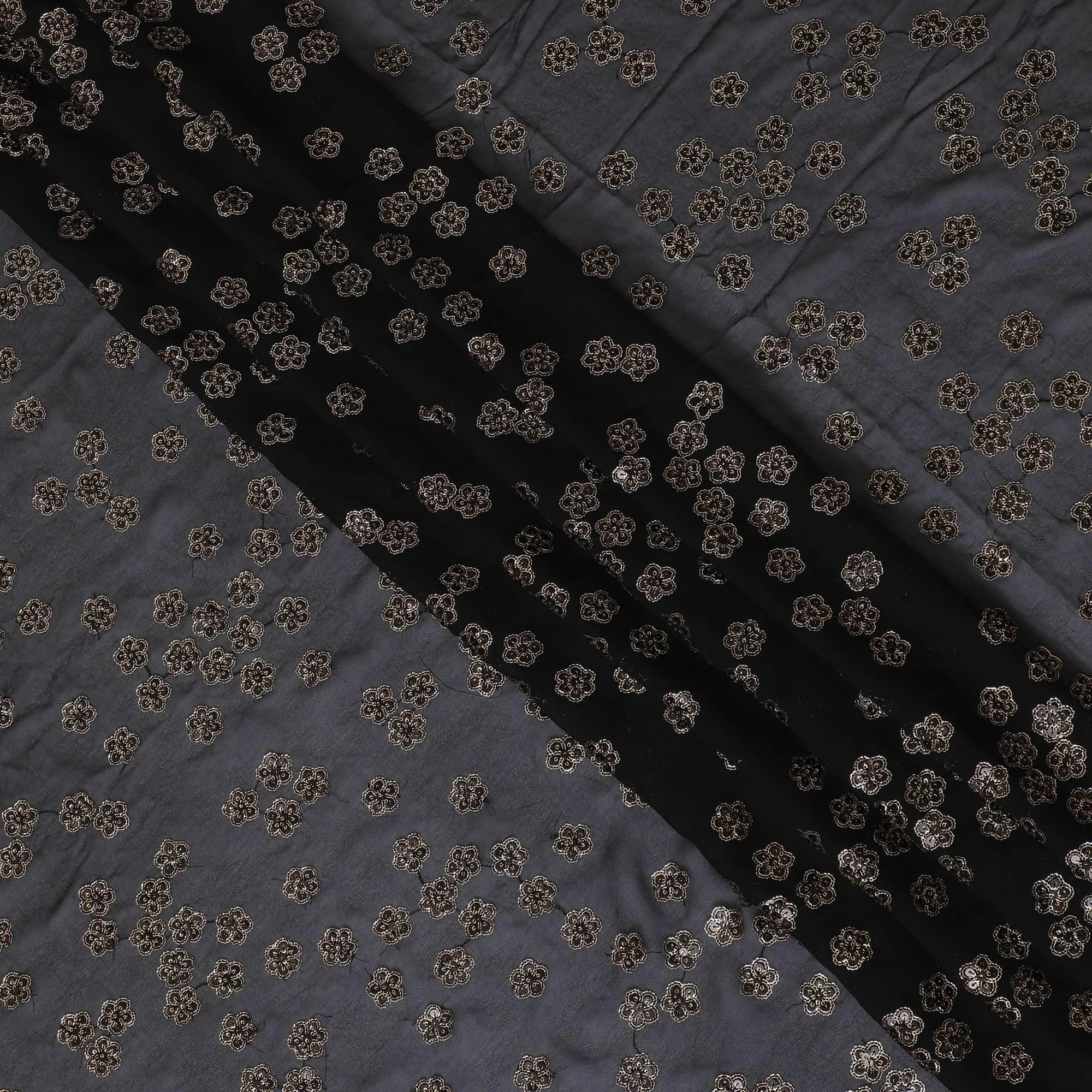 Black synthetic georgette fabric with gold and black sequins in floral design-D15840